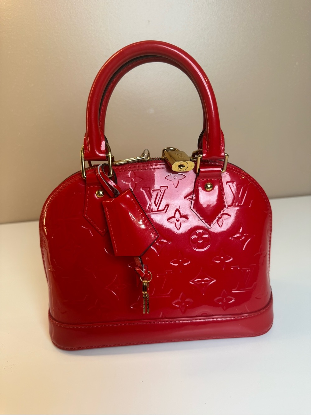 Louis Vuitton Red Patent Alma Satchel with Gold Hardware
